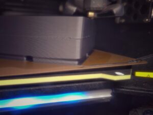 Print sheet lifted off the print bed (retraction forces).