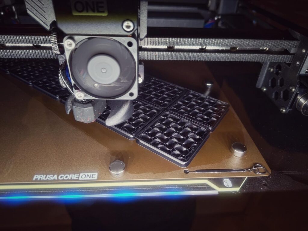 Additional magnets to hold down the print sheet